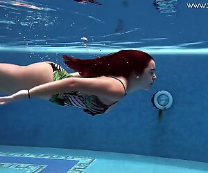 Diana Rius with hot tits touches her body underwater